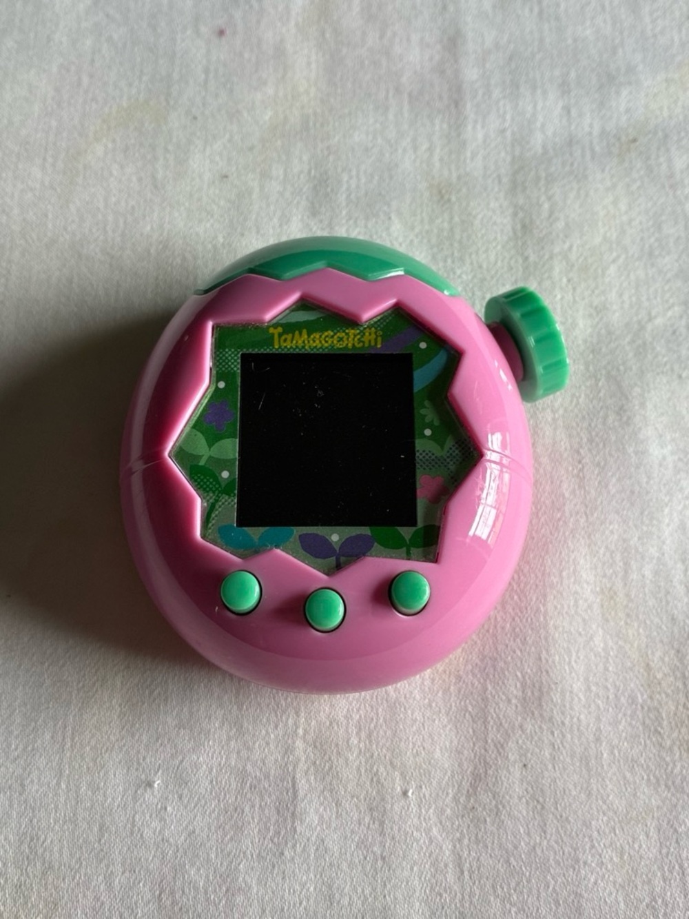 Tamagotchi Pink Virtual Pet with Green Accents
